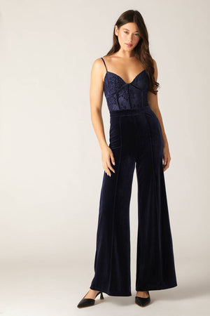 A woven lace and velvet jumpsuit