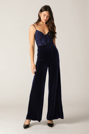 A woven lace and velvet jumpsuit